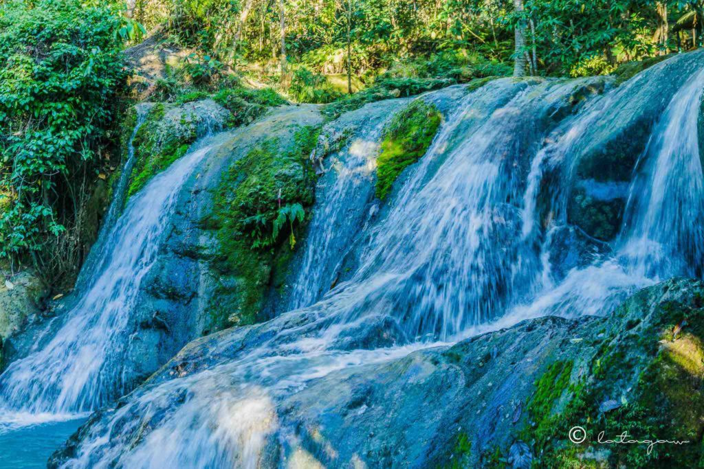 cascading water of hagimit falls located in the island garden city of samal davao del norte philippines