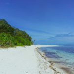 long stretch of white sand in mantigue camiguin philippines